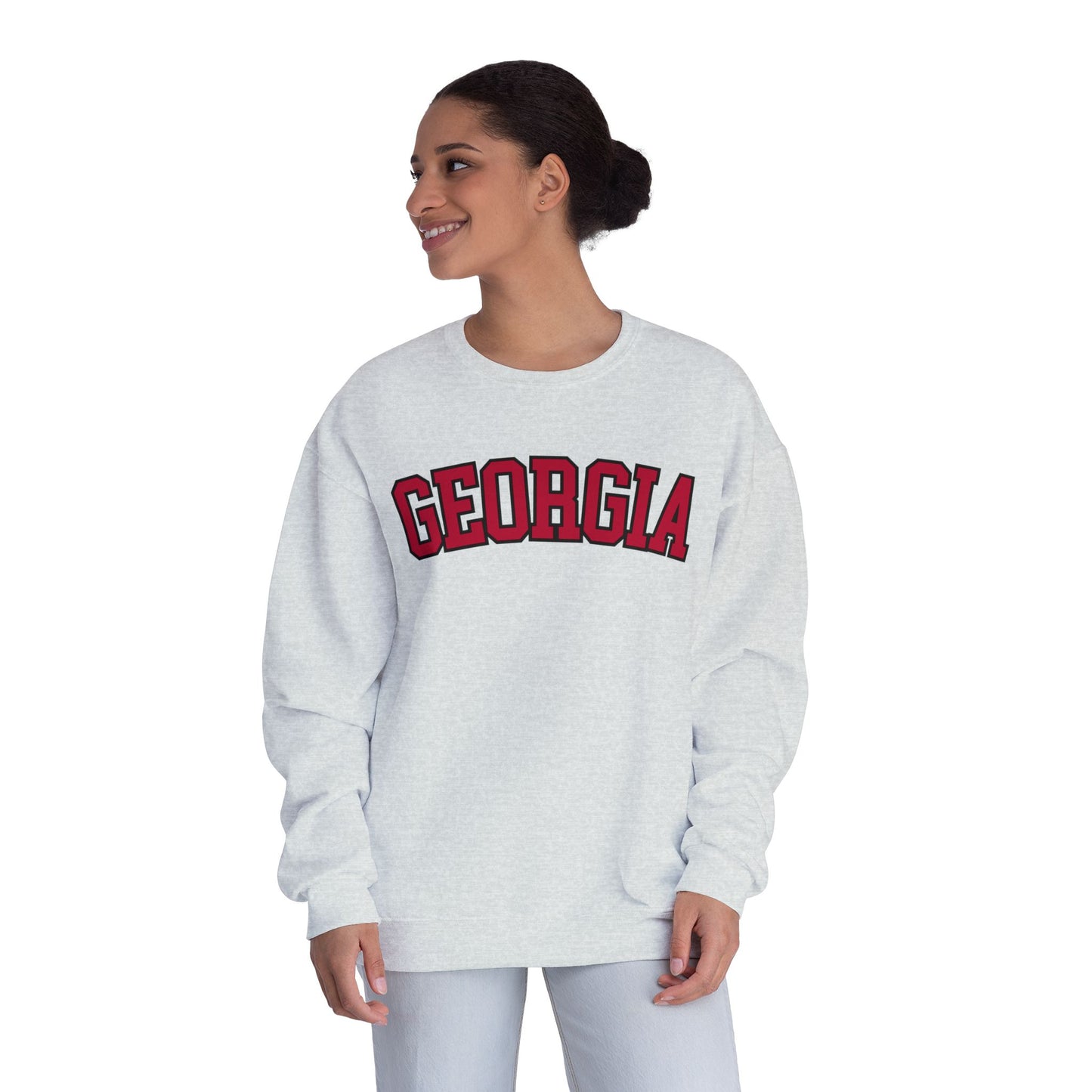 Woman wearing a gray sweatshirt with 'Georgia' printed on it against a white background