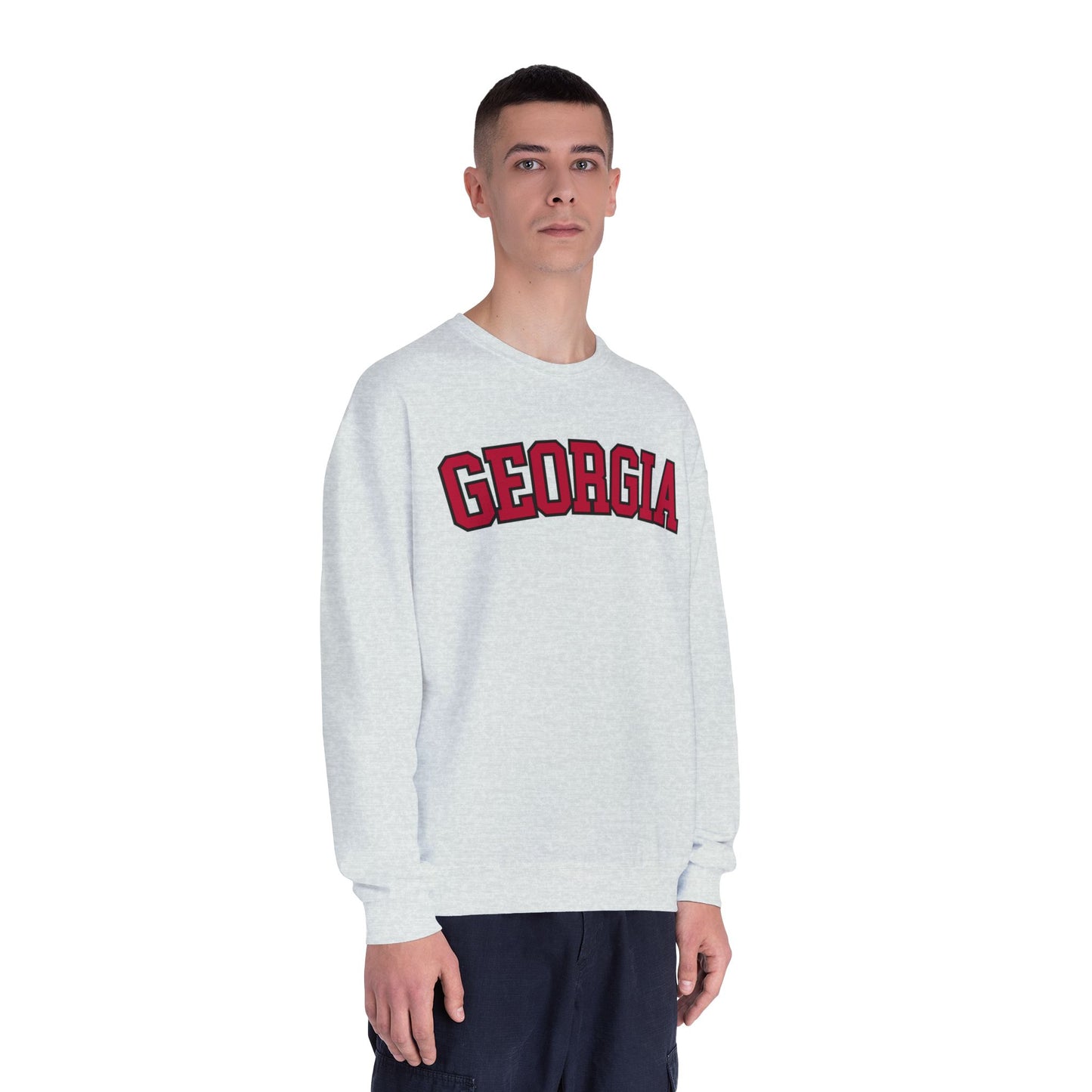 Person wearing a white sweatshirt with 'Georgia' printed in red on a white background
