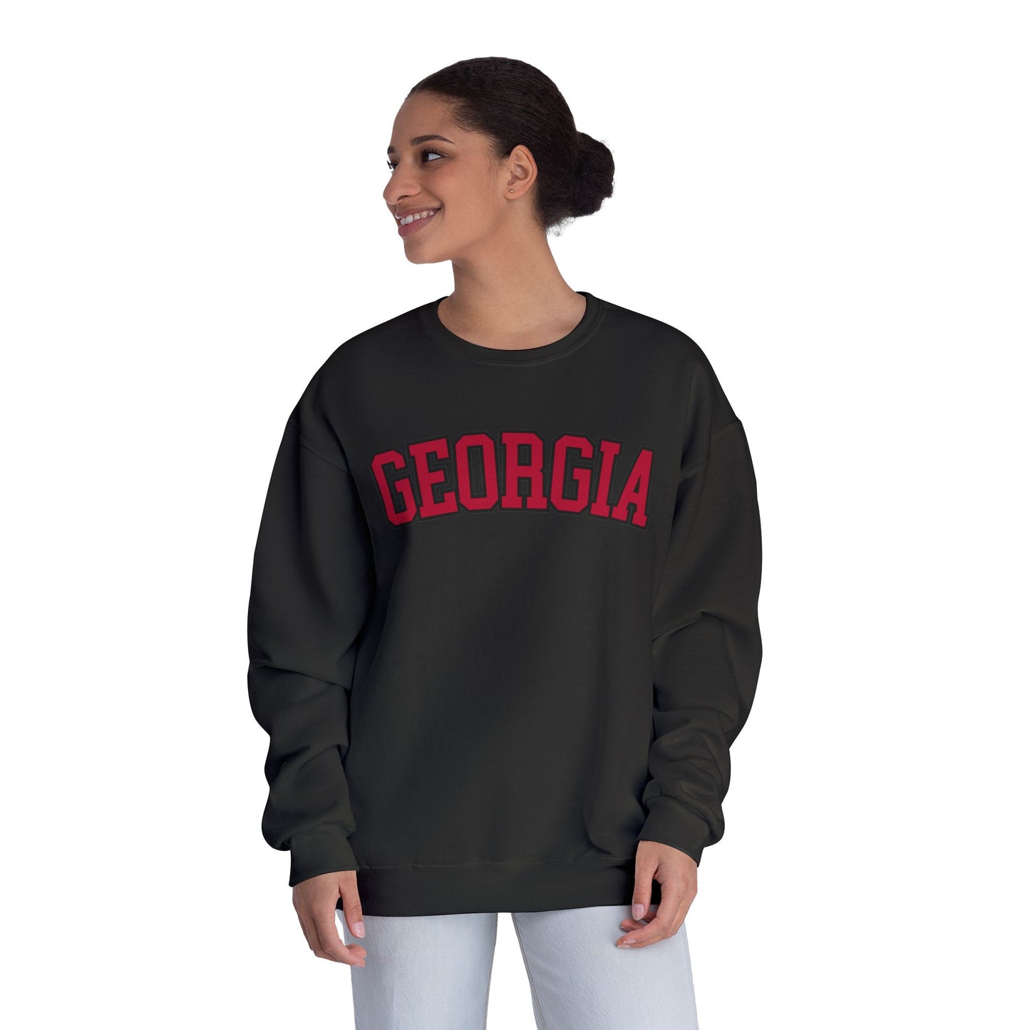 Person wearing a black sweatshirt with 'GEORGIA' printed in red on a white background