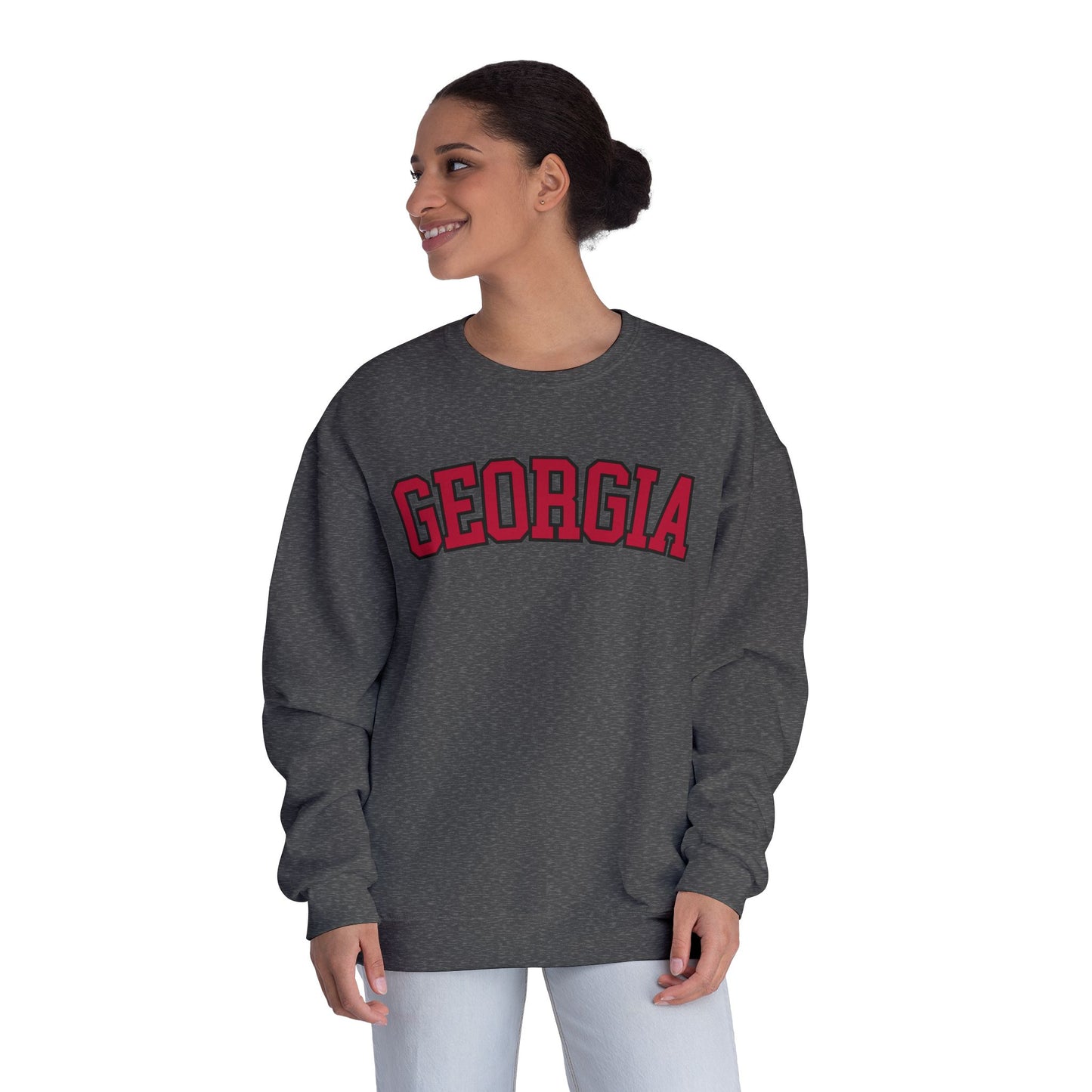 Person wearing a gray sweatshirt with 'Georgia' printed in red on a white background