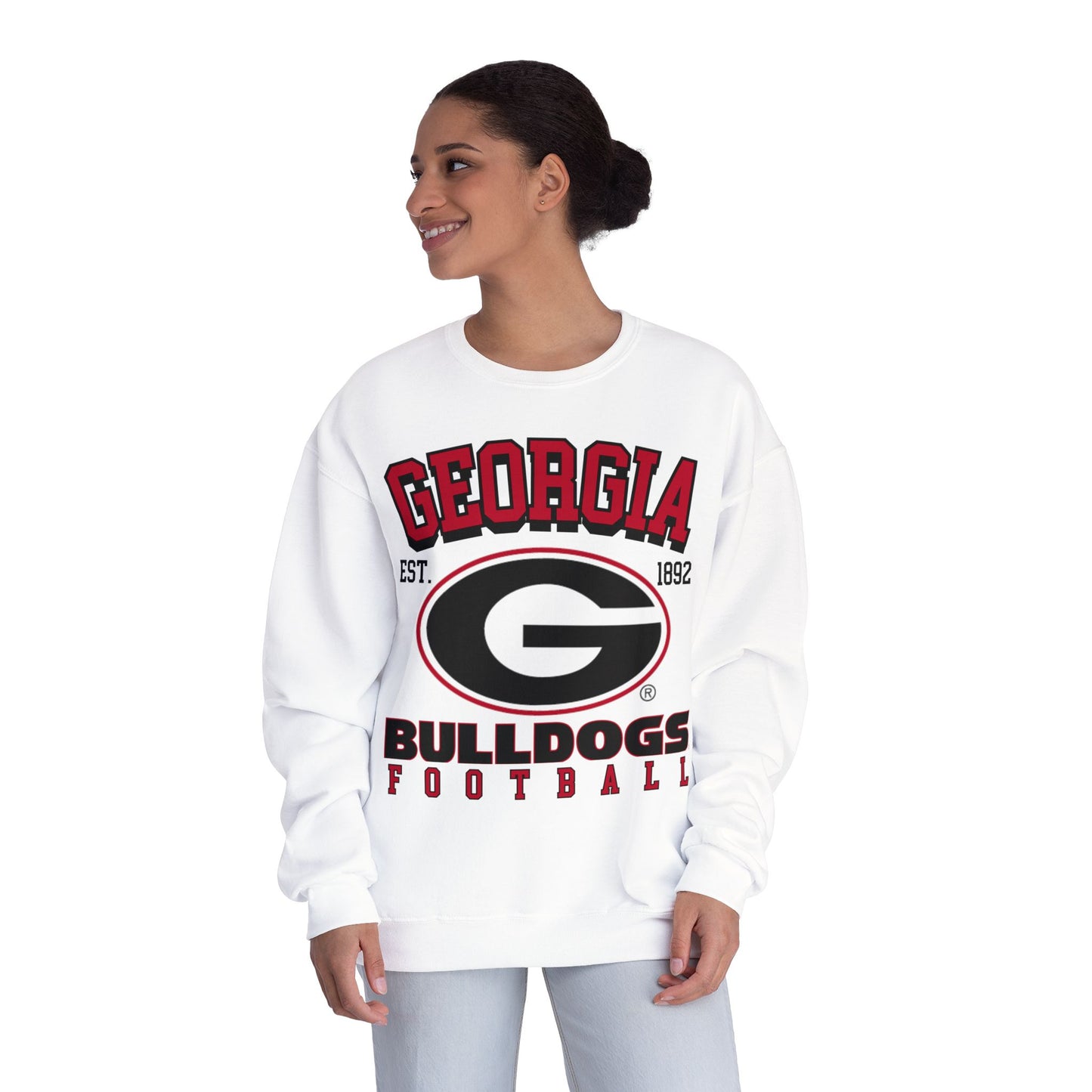 Woman wearing a white sweatshirt with 'Georgia Bulldogs Football' text and logo on a white background