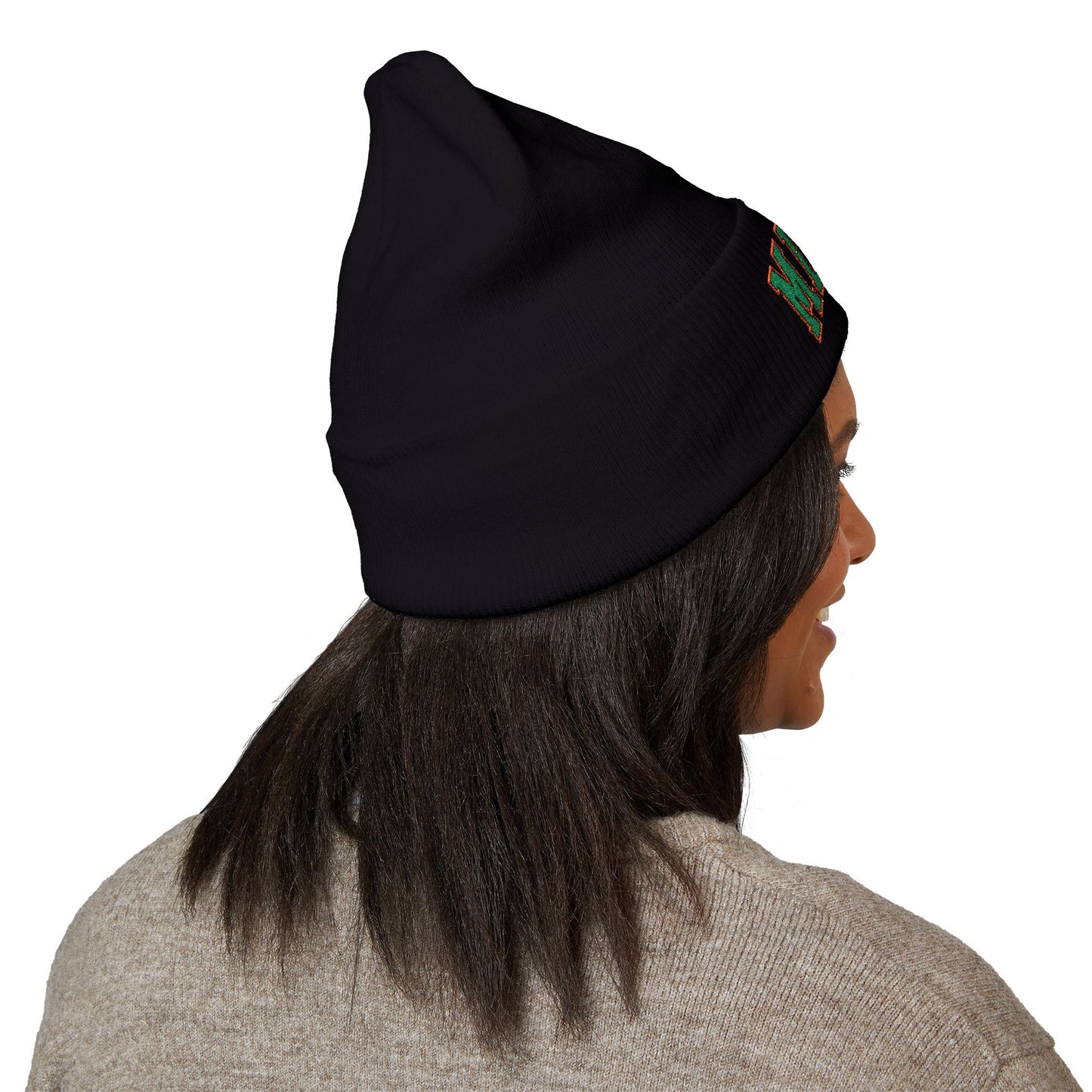 Person wearing a black beanie with a logo on a white background with miami logo on it