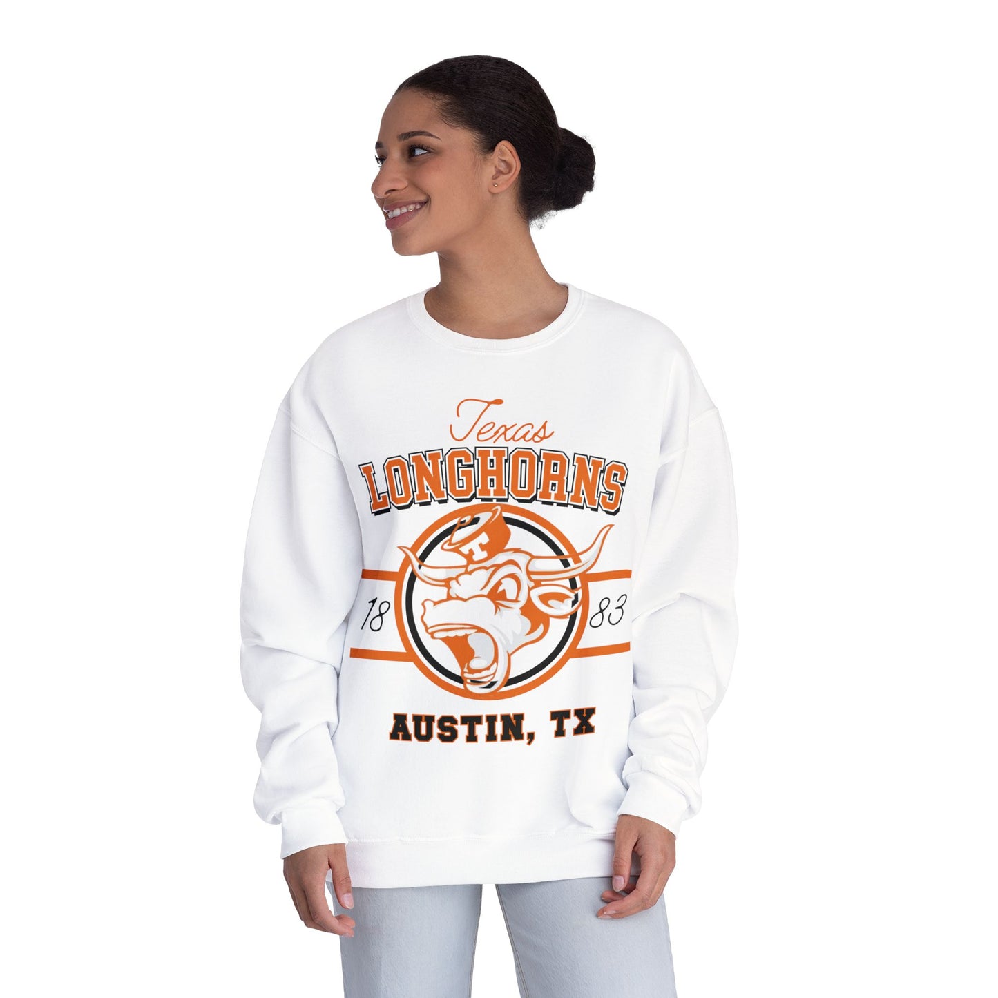 Woman wearing a white 'Texas Longhorns' sweatshirt with orange and brown graphics on a white background
