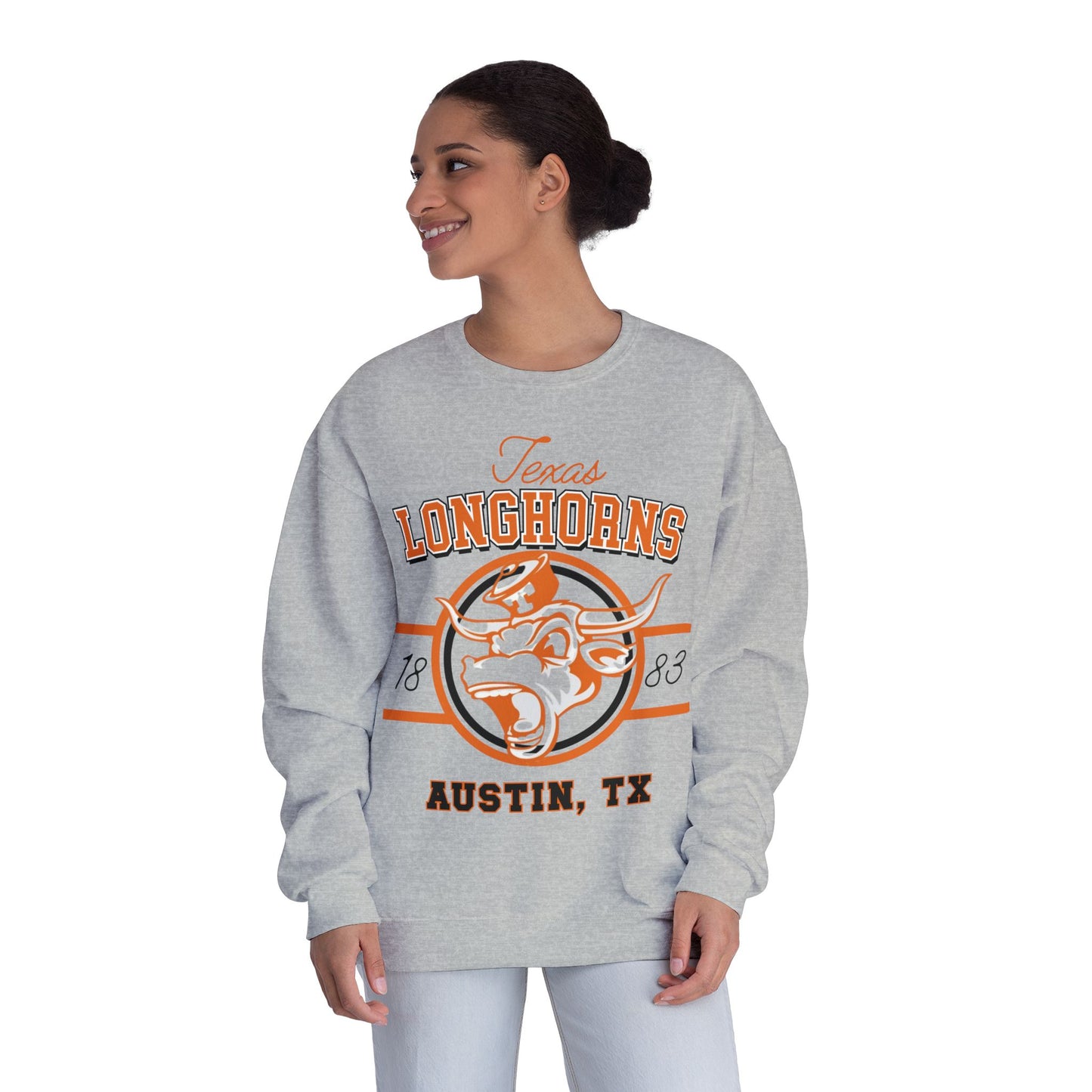 Woman wearing a gray 'Texas Longhorns' sweatshirt on a white background