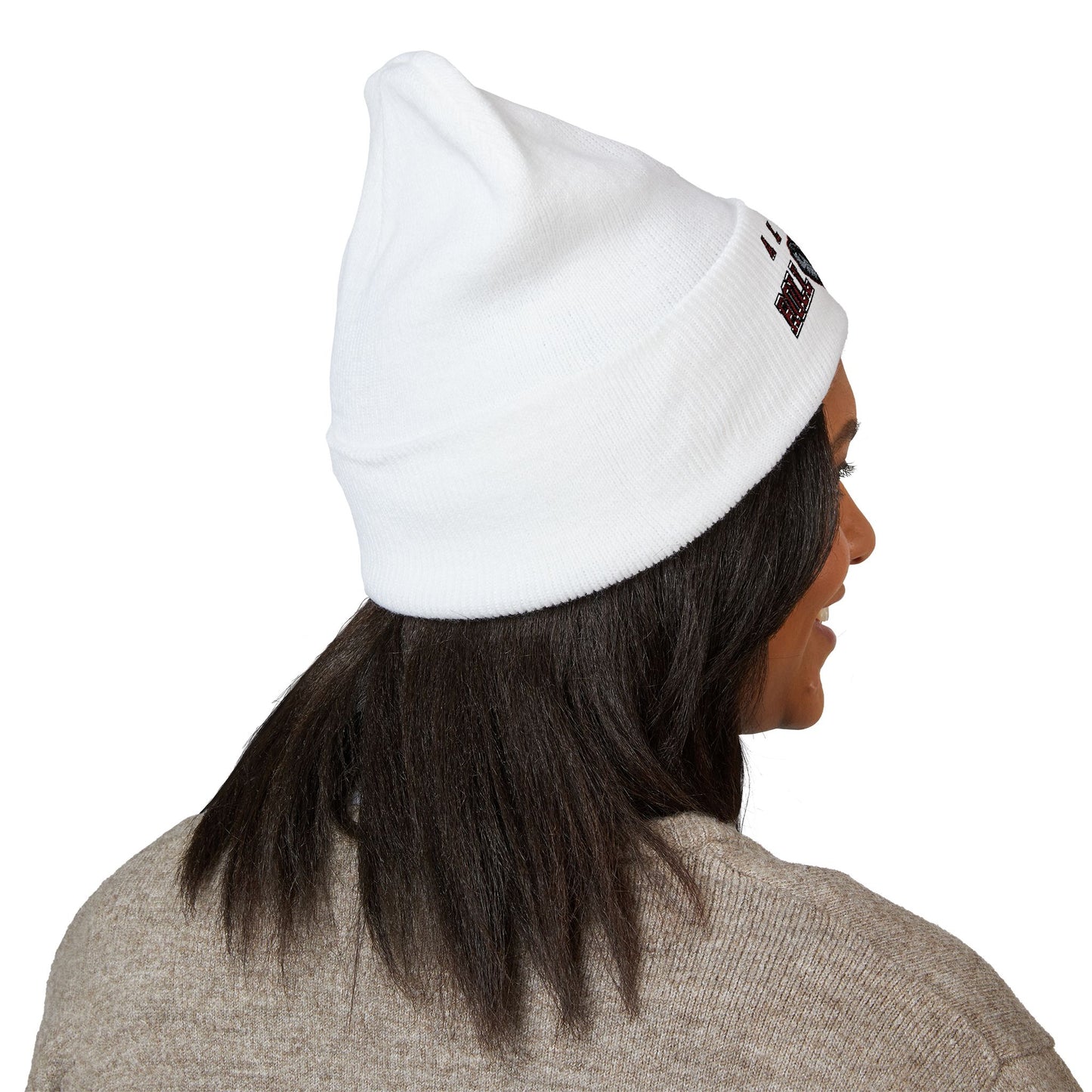 Person wearing a white beanie with a logo on a white background alabama roll tide logo